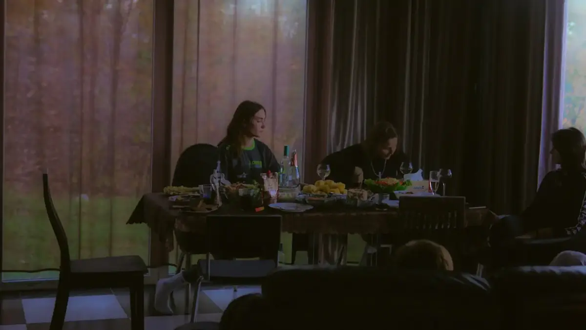 a group of people sitting around a table
