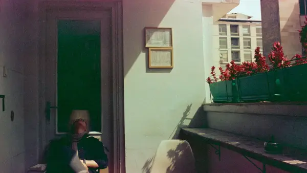 A person sitting on a chair in a room