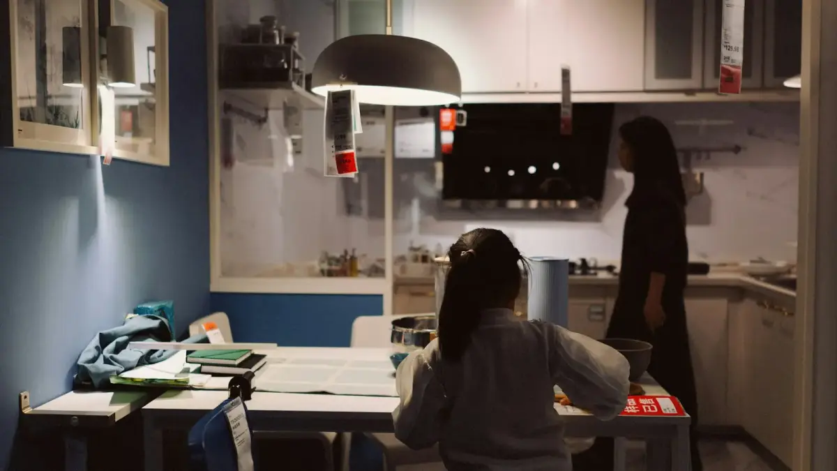 Two people in a modern kitchen setting.