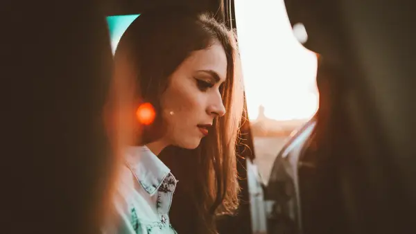 woman in white collared shirt