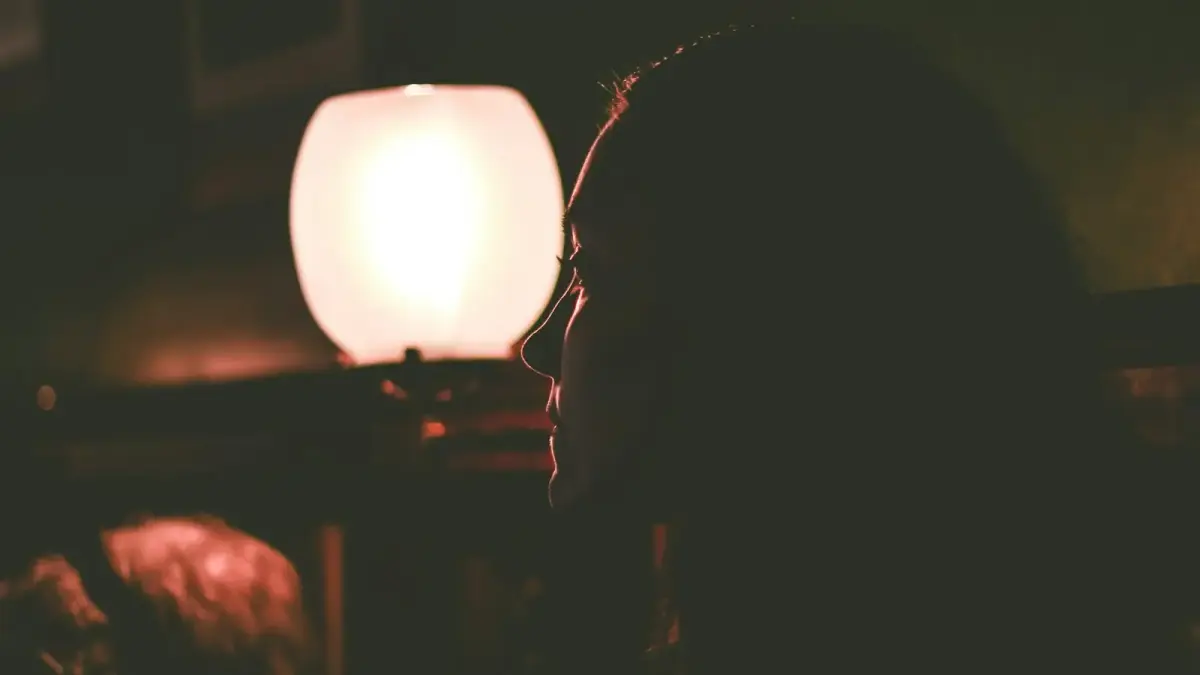 woman wearing black framed eyeglasses