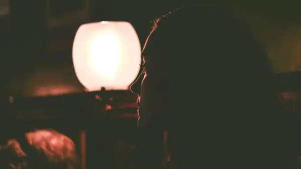 woman wearing black framed eyeglasses
