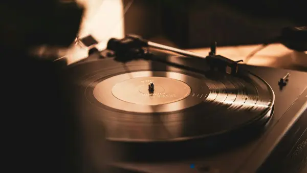 A vinyl record playing on a turntable.