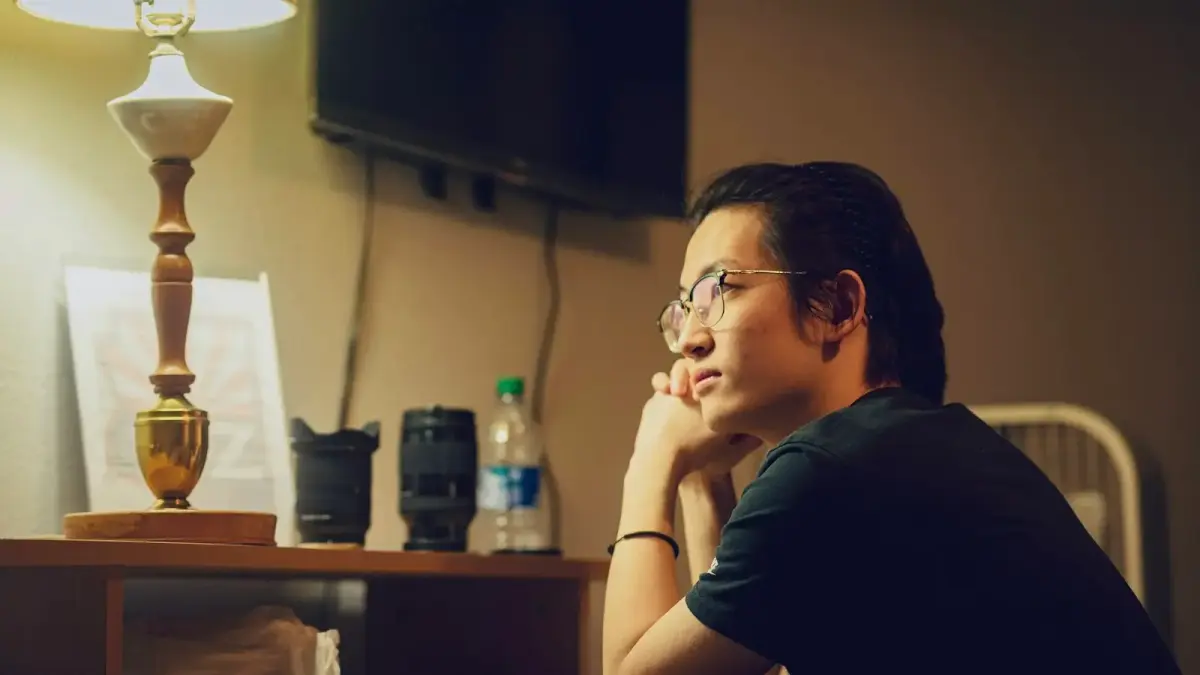 woman in black crew neck t-shirt wearing eyeglasses