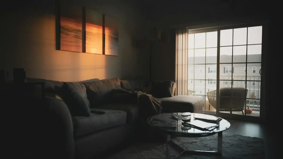 sectional sofa near coffee table and window