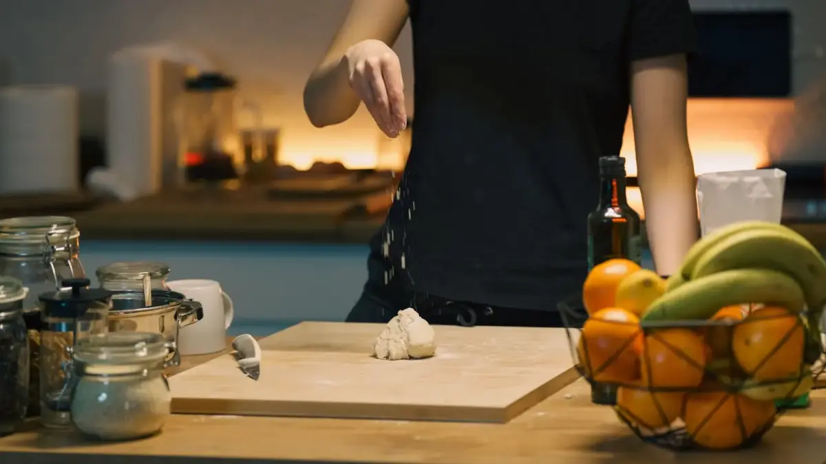 Person preparing food in a kitchen