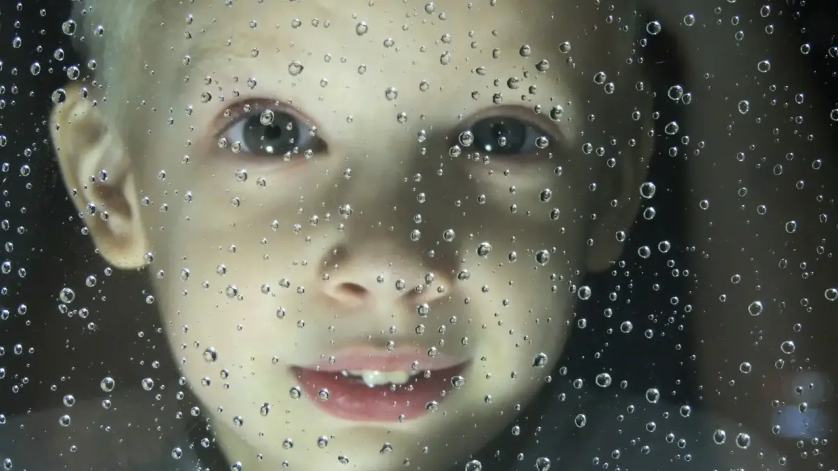 girls face with water droplets