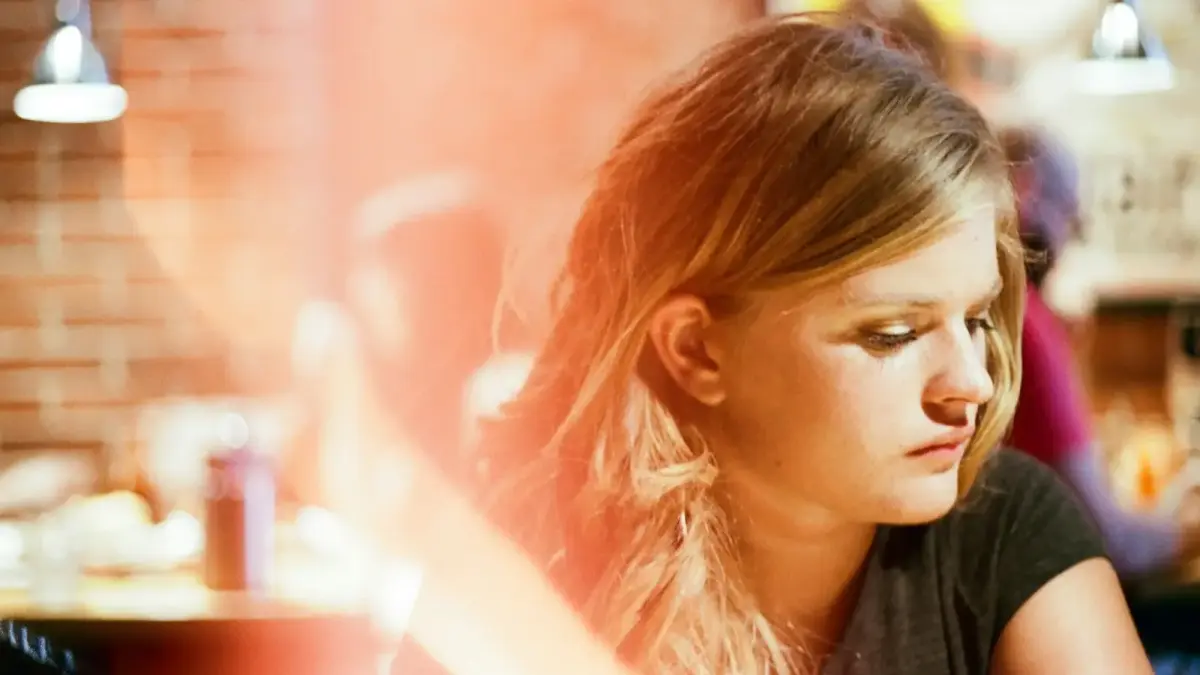 woman wears black blouse