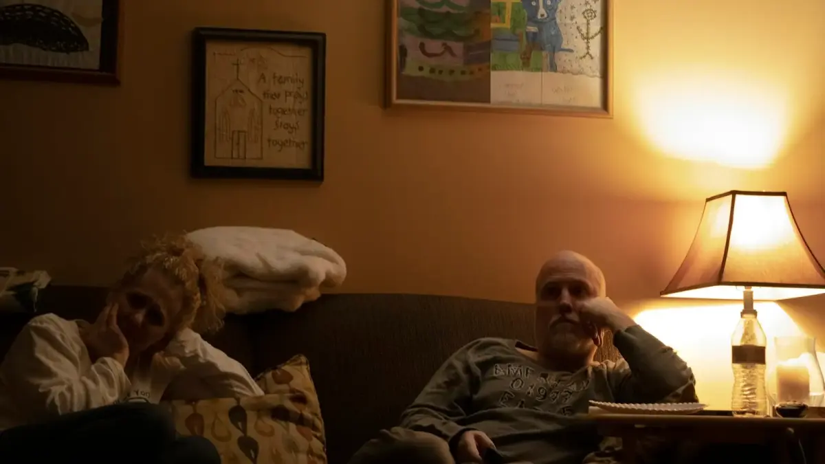a man and a woman sitting on a couch