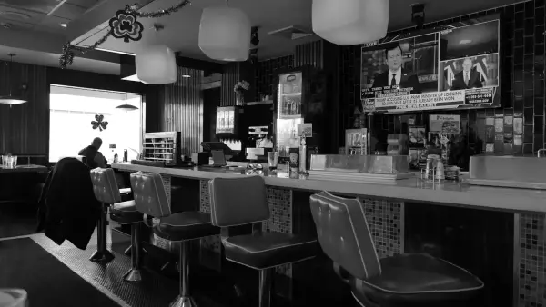 Retro diner interior with counter and stools