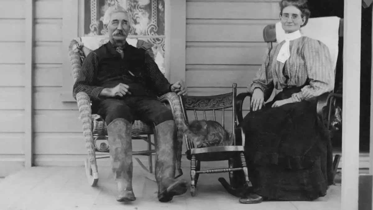 Elderly couple sitting on a porch