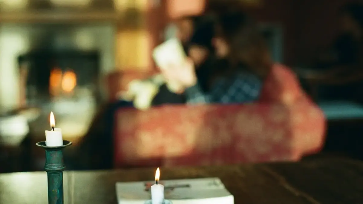 a candle sitting on top of a wooden table