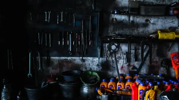 Tools and oil bottles in a workshop