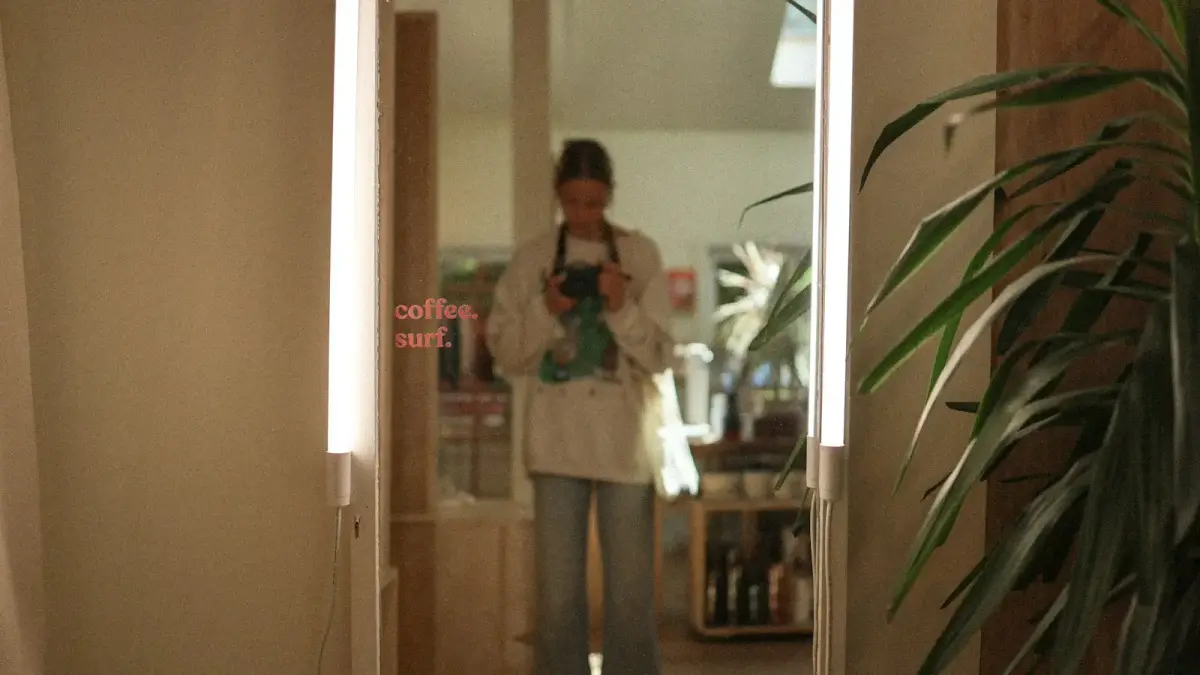 a person taking a selfie in a mirror