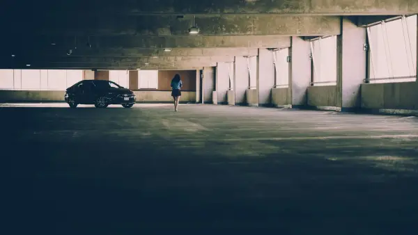 person standing near vehicle
