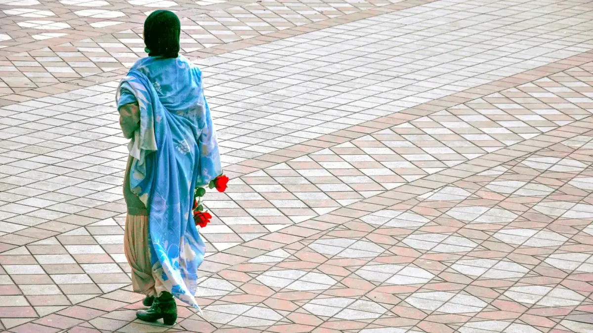 woman standing on road