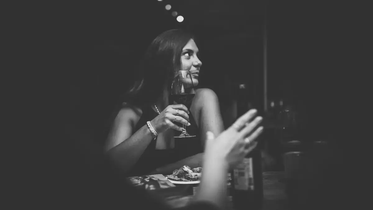 a woman sitting at a table