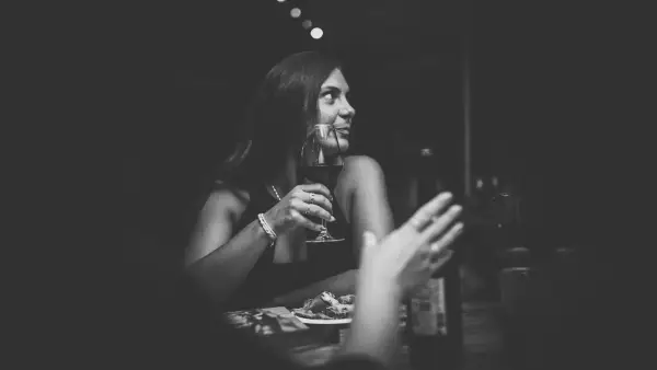 a woman sitting at a table