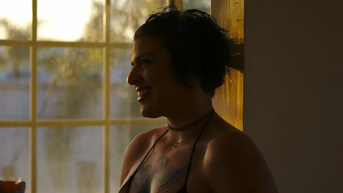 smiling woman wearing brassiere