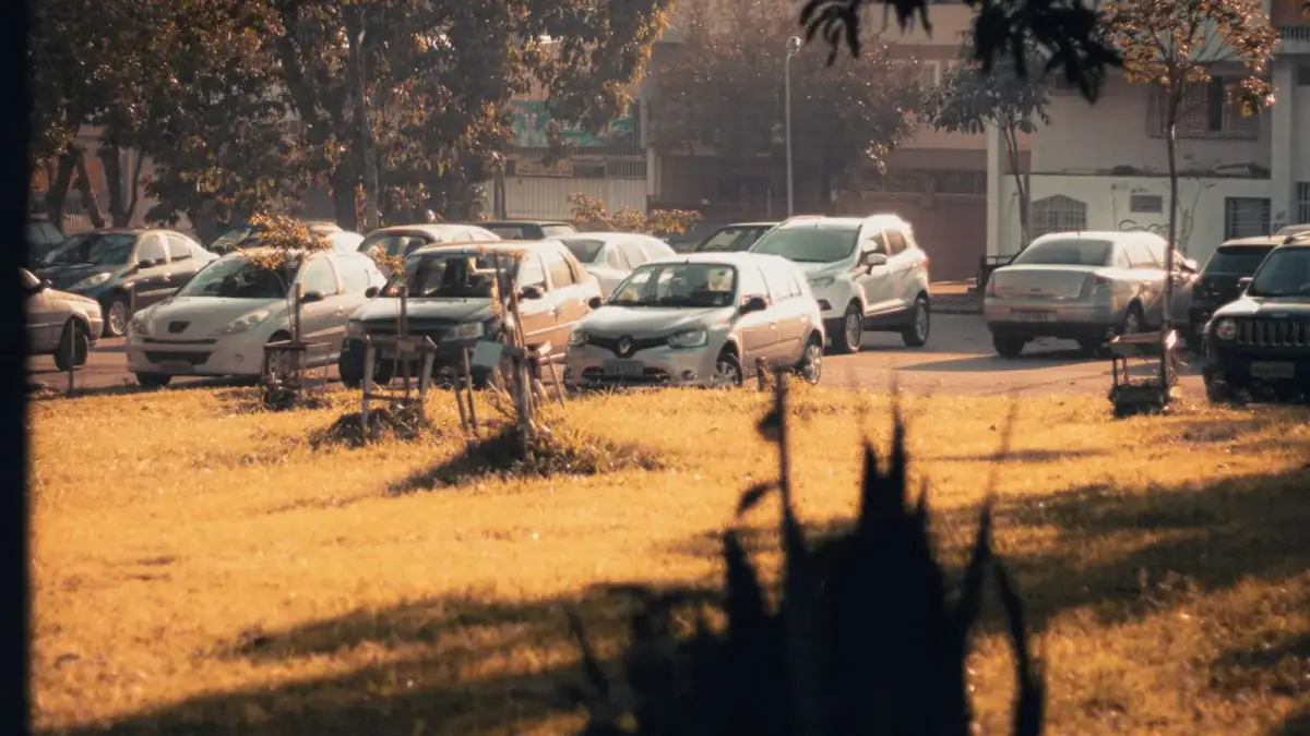 cars parked on parking lot during daytime