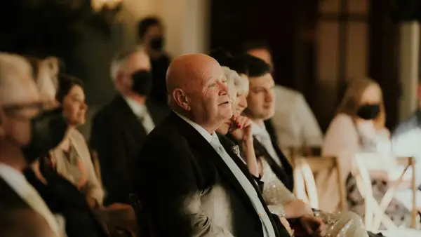 a group of people sitting next to each other