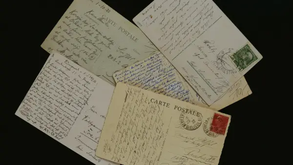 a pile of old envelopes sitting on top of each other